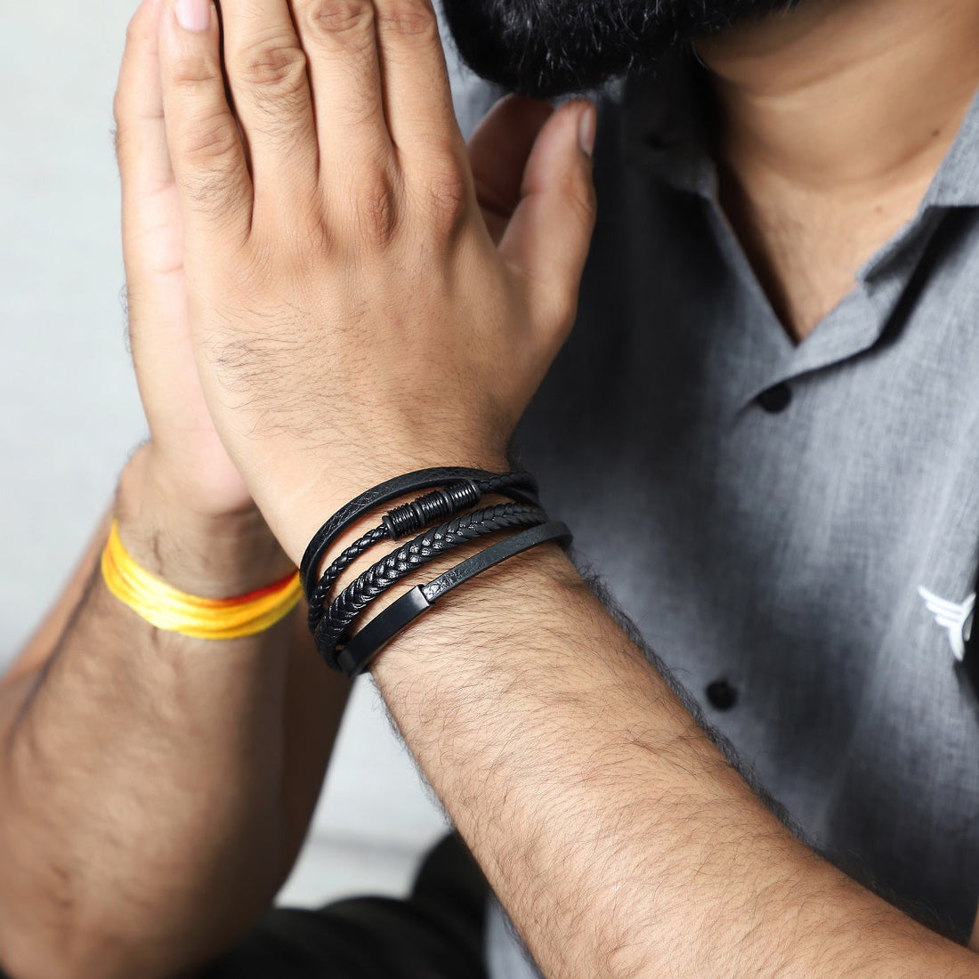 Wrist shot of the bracelet elegantly styled with a casual outfit, highlighting its appeal